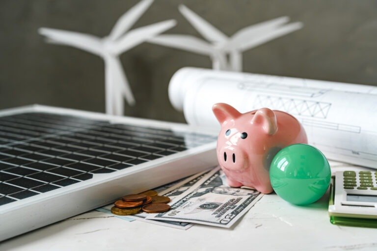 Models of windmill and solar panel, alternative energy sources